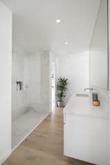 Bath Room, Light Hardwood Floor, Drop In Sink, Open Shower, and Ceiling Lighting  Photos from Vista De la Cumbra