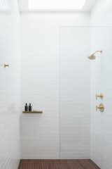 Bath Room, Subway Tile Wall, Recessed Lighting, Wood Counter, Open Shower, Dark Hardwood Floor, and Undermount Sink  Photos from Minimalist Urban Residence