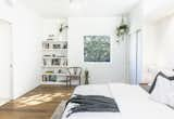 Bedroom, Table Lighting, Night Stands, Bed, and Light Hardwood Floor Master Bedroom  Photo 7 of 27 in The Live Oak House by Mandy Cheng Design