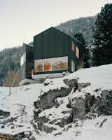 Local building nostalgia and the majestic surrounding mountains guide Geneva architect Simon Chessex in designing a young couple’s modern dream house, built on family land.  Photo 23 of 26 in 26 Peaceful Homes That Feel Like Zen Sanctuaries from Quietly Swiss
