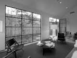 The big window and door in the living room provide a connection to the aspen trees outside.  Photo 9 of 13 in Retreat in the Aspen Grove