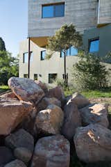 A double-stud wall assembly and triple pane Zola European Windows create a super-insulated envelope, powered by a geothermal ground source heat pump and 10 kw PV system.