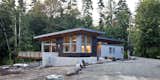 Shou Sugi Ban (charred wood) siding creates a resilient and beautifully, natural feel. Zinc-alum metal siding provides a hard contrast to the organic nature of the rest of the exterior.