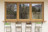 These Zola Windows provide a seamless indoor/outdoor connection, with 9′ wide custom countertop folding window that opens the kitchen up to the backyard.