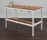 The Clean Slate desk by Modify Furniture designed for the modern minimalist.  Hidden storage mounted flush into the surface of the desk keeps accessories at hand without clutter