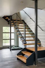 Every inch of this was designed and coordinated with my steel fabricator, wood tread craftsman and framing crew. Raw blackened steel was used as an industrial, but clean modern element. 
