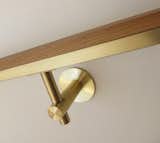 522RBRASS hand rail bracket and grip rail with solid brass and 1/2" walnut cap. 