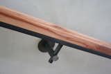 522RHR hot rolled steel architectural handrail bracket with custom hot rolled and madrone grip rail