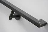 522SHR hot rolled steel hand rail bracket with clear satin finish and custom solid hot rolled steel grip rail. Mitered cut and hidden welds. All finished with clear satin.