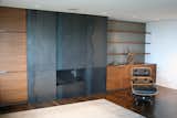 Paneled Hot rolled steel fireplace surround. Finished with clear satin