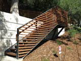 Open riser front steps Hot dipped galvanized steel with black patina and wood slate railing
