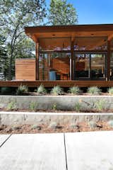 South side with concrete stepped retaining walls  Photo 1 of 21 in Higgins Lake House by Jeff Jordan Architects