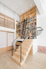 Office, Library Room Type, Craft Room Room Type, Study Room Type, Storage, Shelves, and Light Hardwood Floor Stair leading to loft bedroom and library  Photo 10 of 12 in Wells Fargo Loft by Jeff Jordan Architects