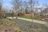 Front left showing gravel drive and garden