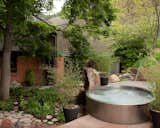 Circular Spa in Stainless Steel with Water Spout Feature
