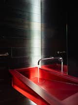 Translucent trough vanity sink created for Olson Kundig.