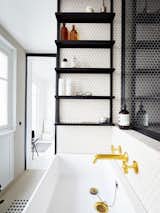 Install Wall-Mounted Faucets

Counter space is a coveted luxury in a small bathrooms. Free up some room for storage and display by mounting your faucet and levers to the wall. Use the newly available space for canisters and containers to conceal your must-have grooming and beauty supplies.

Photo courtesy of Septembre Architecture

#design #smallspace #storage #mydomaine #bathroom #sink