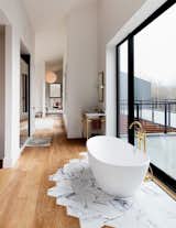 It might look complicated, but Studio DB's Britt and Damian Zunino, the duo behind this stunning bathroom space, say transitioning tiles to wooden floorboards is surprisingly straightforward. "The first step is getting your contractor on board, but the actual work isn't that complicated," they told MyDomaine. 

Photo courtesy Preston Schlebusch for The New York Times
#design #interior #home #tiletransitioning #mydomaine #bathroom