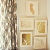 Curtains from West Elm. Foil print gallery wall from Minted.