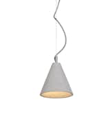 The KOBE 1 is a sleek, stylish and modern pendant lamp made from hand-cast concrete. The concrete shade has then been finished with sleek steel elements and is hung from a simple braided cable. The concrete pendant lamp has been designed in a cone shape, with smooth edges, and a sleek curved edge. The KOBE 1 shade is a beautiful fixture that could even be considered an art piece due to its elegant design. 