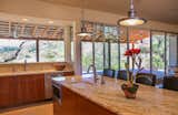 The kitchen has some of the best views in the house. The sink counter protrudes into the rear porch, with windows on three sides. The owner's refer to it as the "bridge of the ship." 