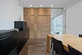 Dining Room. Special made boiserie in natural oak, furnitures by Poliform