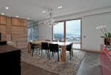 Dining Room. Special made boiserie in natura oak, furnitures by Poliform
