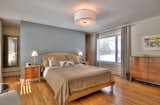 Master bedroom  Photo 8 of 23 in Prairie School Inspired Stone Home on the Golf course by Luc Bedard