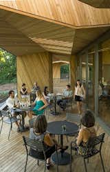 The main tasting room is flanked by outdoor tasting rooms, a formal terrace for private events and other outdoor spaces for guests to explore. Photo by Andrea Johnson. Read more about the design of the winery at imbibemagazine.com/modern-winery-design-sokol-blosser