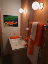 Floating vanity and towel warming rack