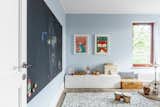 Kids Room, Playroom Room Type, Toddler Age, Storage, Light Hardwood Floor, Pre-Teen Age, and Neutral Gender  Photos from Loft in Poland