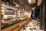 The final touch is the black and white mosaic floor that is the reminiscent of the old stores.