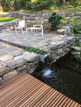 Outdoor, Small Patio, Porch, Deck, Trees, Shrubs, Small Pools, Tubs, Shower, Large Patio, Porch, Deck, Grass, Decking Patio, Porch, Deck, Wood Patio, Porch, Deck, Back Yard, and Stone Patio, Porch, Deck Water channel and pond  Photo 11 of 19 in Architect's own Home by Matt Andersen-Miller