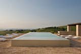 Outdoor, Infinity Pools, Tubs, Shower, Large Pools, Tubs, Shower, Trees, and Grass  Photo 2 of 7 in Villa Olivi by Boutique