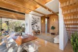 Dining Room, Ceiling Lighting, Table, Chair, and Medium Hardwood Floor  Photo 6 of 9 in Laurel Canyon Boxhouse by Boutique