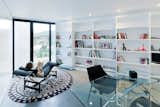 Office, Desk, Study Room Type, Bookcase, Concrete Floor, and Chair  BoutiqueHomes’s Saves from Casa X