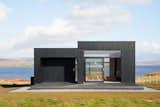 Exterior, Wood Siding Material, Flat RoofLine, and House Building Type  Photo 1 of 6 in Harlosh Black H by Boutique
