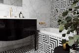 This dramatic black and white bath exudes pure glitz and glamour. 