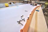 Template construction for a new 7 foot bench.
The finished template will guide a wood router to cut the desired shape from each bench panel.