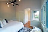 This is an additional shot of the master bedroom w/ adjacent over-haning balcony.   -Photos by Black Olive Photographic