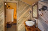The Autonomous Tent at Treebones Resort | Generates its own Power and Processes its Own Waste

The Autonomous Tent has an open floor plan, providing total customization for a private residence, a yoga studio, a spa, a resort suite or studio.  The Autonomous Tent at Treebones has an en suite bathroom including a claw foot shower and flushable composting toilet.  The unit includes custom beetle pine woodwork pine and live edge vanity. 