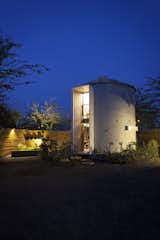 Tucked into the urban grid, a 340-square-foot grain silo becomes an unexpected desert oasis that overcomes several design challenges. Architect Christoph&nbsp;Kaiser maximized space by lining the envelope with the bed, bath, and cooking area. "What I learned in early investigations is that I wanted to preserve the verticality of space," he says. "While you’re in a relatively small house, you’re afforded generous space with 26-foot high ceilings."&nbsp;The ergonomic bathroom was intentionally designed with an outdoor shower to maximize square footage inside the silo house.