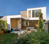 The family prioritized outdoor space, as their home serves as a central gathering place for the neighborhood.