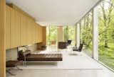 Ludwig Mies van der Rohe's famed Barcelona collection outfits the interior of the Farnsworth home.&nbsp;