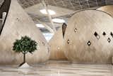 Through natural materials, colors, and the warm, inviting cocoons, Autoban has disrupted airport design as we know it with Heydar Aliyev International Airport.