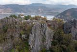 Architect Ignacio Urquiza knew this plot of land and its views, as he had walked it often as a child. While most of the homes face south, Urquiza took advantage of the mountaintop siting with views spanning both mountains and lake.