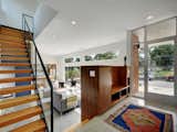 Staircase, Wood Tread, and Metal Railing Front Entryway  Photo 13 of 15 in KRDB Swede Hill Modern