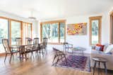 Living & Dining Room — ample windows provide early morning daylight while being shielded from the harsh afternoon sun.