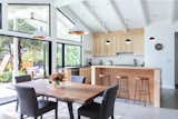 The opening from the kitchen/dining area to the outside was expanded with a bifold door.