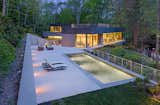 The Weston Residence nestles in a valley adjacent to the Saugatuck River. It’s a small house, but takes advantage of its beautiful site in a way that purposefully blurs the distinction between the built and natural environment.